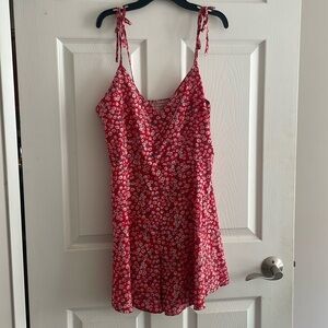Cute red floral summer romper with spaghetti tie straps